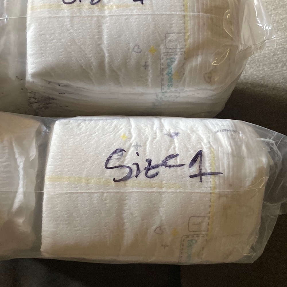 Unopened, NEVER USED PAMPERS size 1 diapers 168 total separated in 2 packs